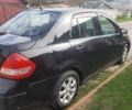 Черный Ниссан Тиида, объемом двигателя 1.8 л и пробегом 270 тыс. км за 2900 $, фото 30 на Automoto.ua