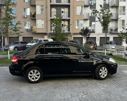 Черный Ниссан Тиида, объемом двигателя 1.6 л и пробегом 165 тыс. км за 7000 $, фото 3 на Automoto.ua