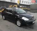 Черный Ниссан Тиида, объемом двигателя 1.6 л и пробегом 190 тыс. км за 6200 $, фото 1 на Automoto.ua