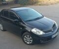 Чорний Ніссан Тііда, об'ємом двигуна 1.6 л та пробігом 244 тис. км за 4500 $, фото 1 на Automoto.ua