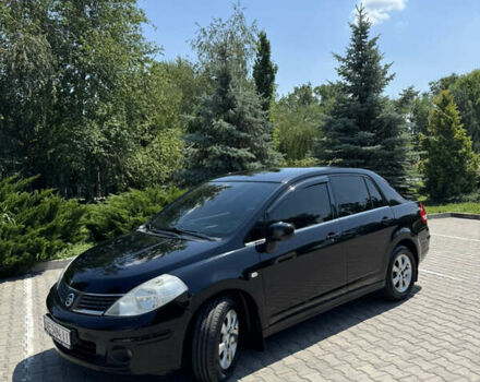 Черный Ниссан Тиида, объемом двигателя 1.6 л и пробегом 165 тыс. км за 7000 $, фото 4 на Automoto.ua