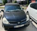 Черный Ниссан Тиида, объемом двигателя 1.6 л и пробегом 237 тыс. км за 4500 $, фото 1 на Automoto.ua