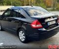 Черный Ниссан Тиида, объемом двигателя 1.6 л и пробегом 137 тыс. км за 5700 $, фото 3 на Automoto.ua