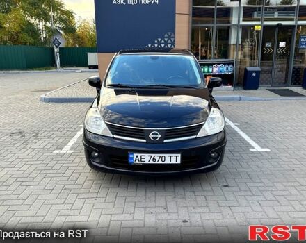 Черный Ниссан Тиида, объемом двигателя 1.6 л и пробегом 137 тыс. км за 5700 $, фото 1 на Automoto.ua