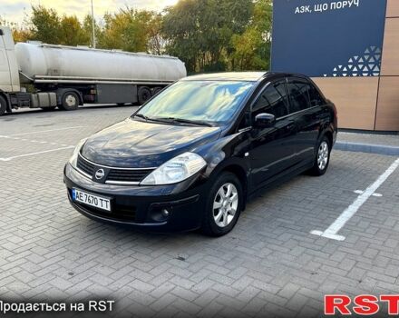 Черный Ниссан Тиида, объемом двигателя 1.6 л и пробегом 137 тыс. км за 5700 $, фото 2 на Automoto.ua