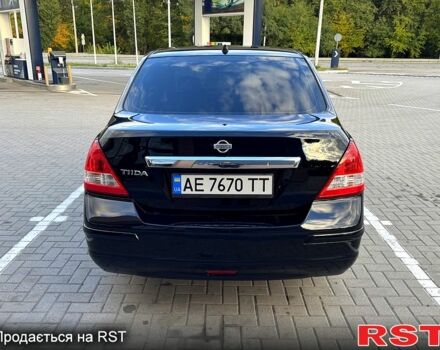 Черный Ниссан Тиида, объемом двигателя 1.6 л и пробегом 137 тыс. км за 5700 $, фото 4 на Automoto.ua