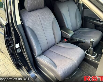 Черный Ниссан Тиида, объемом двигателя 1.6 л и пробегом 137 тыс. км за 5700 $, фото 7 на Automoto.ua