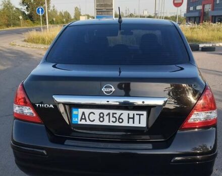 Черный Ниссан Тиида, объемом двигателя 1.8 л и пробегом 110 тыс. км за 7300 $, фото 4 на Automoto.ua
