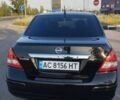Черный Ниссан Тиида, объемом двигателя 1.8 л и пробегом 110 тыс. км за 7300 $, фото 4 на Automoto.ua