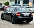 Черный Ниссан Тиида, объемом двигателя 1.6 л и пробегом 170 тыс. км за 4199 $, фото 3 на Automoto.ua