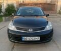 Черный Ниссан Тиида, объемом двигателя 1.6 л и пробегом 137 тыс. км за 6500 $, фото 1 на Automoto.ua