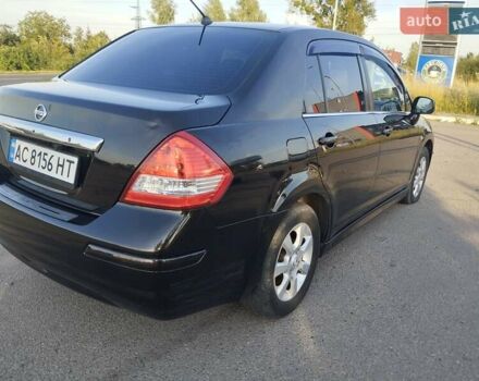 Черный Ниссан Тиида, объемом двигателя 1.8 л и пробегом 110 тыс. км за 7300 $, фото 2 на Automoto.ua