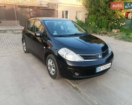 Черный Ниссан Тиида, объемом двигателя 1.6 л и пробегом 137 тыс. км за 6500 $, фото 4 на Automoto.ua