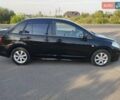 Черный Ниссан Тиида, объемом двигателя 1.8 л и пробегом 110 тыс. км за 7300 $, фото 1 на Automoto.ua
