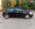 Черный Ниссан Тиида, объемом двигателя 1.6 л и пробегом 137 тыс. км за 6500 $, фото 7 на Automoto.ua