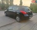 Черный Ниссан Тиида, объемом двигателя 1.6 л и пробегом 137 тыс. км за 6500 $, фото 12 на Automoto.ua
