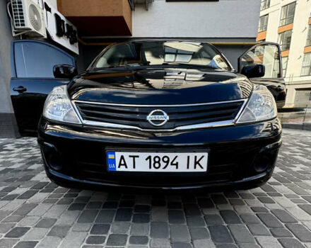 Черный Ниссан Тиида, объемом двигателя 1.6 л и пробегом 192 тыс. км за 5499 $, фото 20 на Automoto.ua