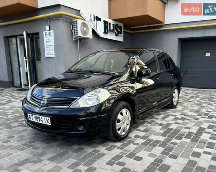Черный Ниссан Тиида, объемом двигателя 1.6 л и пробегом 192 тыс. км за 5499 $, фото 4 на Automoto.ua
