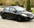 Черный Ниссан Тиида, объемом двигателя 1.6 л и пробегом 170 тыс. км за 4199 $, фото 1 на Automoto.ua