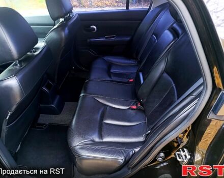 Черный Ниссан Тиида, объемом двигателя 1.8 л и пробегом 110 тыс. км за 5600 $, фото 6 на Automoto.ua