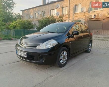 Черный Ниссан Тиида, объемом двигателя 1.6 л и пробегом 137 тыс. км за 6500 $, фото 2 на Automoto.ua
