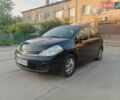 Черный Ниссан Тиида, объемом двигателя 1.6 л и пробегом 137 тыс. км за 6500 $, фото 2 на Automoto.ua