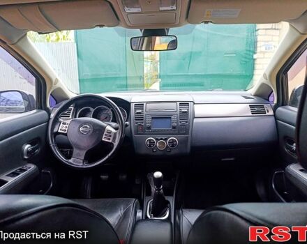 Черный Ниссан Тиида, объемом двигателя 1.8 л и пробегом 110 тыс. км за 5600 $, фото 7 на Automoto.ua