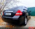 Черный Ниссан Тиида, объемом двигателя 1.8 л и пробегом 110 тыс. км за 5600 $, фото 3 на Automoto.ua