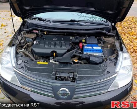 Черный Ниссан Тиида, объемом двигателя 1.8 л и пробегом 110 тыс. км за 5600 $, фото 13 на Automoto.ua