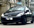 Черный Ниссан Тиида, объемом двигателя 1.6 л и пробегом 176 тыс. км за 3765 $, фото 1 на Automoto.ua