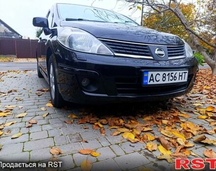 Черный Ниссан Тиида, объемом двигателя 1.8 л и пробегом 110 тыс. км за 5600 $, фото 1 на Automoto.ua