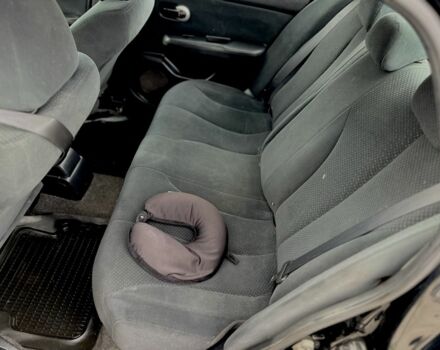 Черный Ниссан Тиида, объемом двигателя 1.6 л и пробегом 170 тыс. км за 4199 $, фото 7 на Automoto.ua