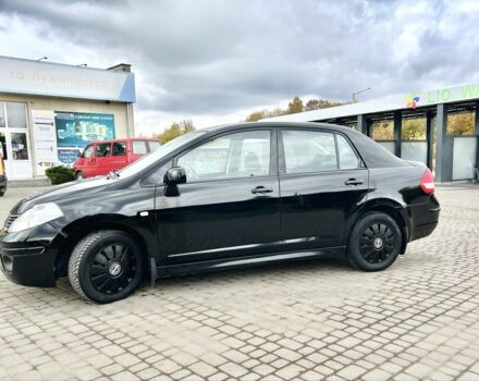 Черный Ниссан Тиида, объемом двигателя 1.6 л и пробегом 170 тыс. км за 4199 $, фото 4 на Automoto.ua