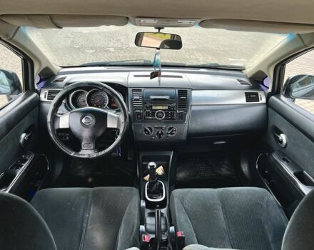 Черный Ниссан Тиида, объемом двигателя 1.6 л и пробегом 170 тыс. км за 4199 $, фото 6 на Automoto.ua