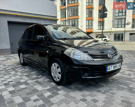 Черный Ниссан Тиида, объемом двигателя 1.6 л и пробегом 192 тыс. км за 5499 $, фото 5 на Automoto.ua
