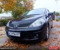 Черный Ниссан Тиида, объемом двигателя 1.8 л и пробегом 110 тыс. км за 5600 $, фото 1 на Automoto.ua