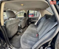 Черный Ниссан Тиида, объемом двигателя 1.6 л и пробегом 192 тыс. км за 5499 $, фото 12 на Automoto.ua