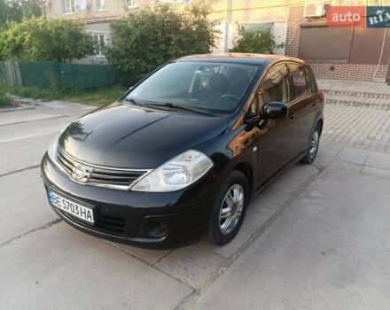 Черный Ниссан Тиида, объемом двигателя 1.6 л и пробегом 137 тыс. км за 6500 $, фото 6 на Automoto.ua
