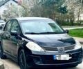 Черный Ниссан Тиида, объемом двигателя 1.6 л и пробегом 177 тыс. км за 3750 $, фото 1 на Automoto.ua