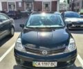 Черный Ниссан Тиида, объемом двигателя 1.6 л и пробегом 125 тыс. км за 6950 $, фото 1 на Automoto.ua