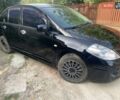 Черный Ниссан Тиида, объемом двигателя 1.6 л и пробегом 182 тыс. км за 3200 $, фото 1 на Automoto.ua