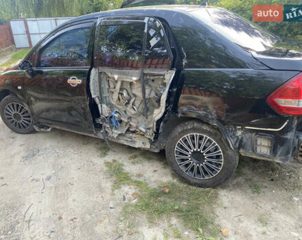 Черный Ниссан Тиида, объемом двигателя 1.6 л и пробегом 182 тыс. км за 3250 $, фото 3 на Automoto.ua