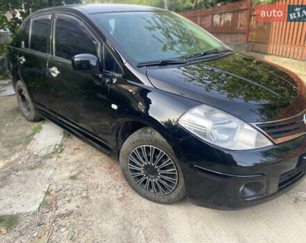 Черный Ниссан Тиида, объемом двигателя 1.6 л и пробегом 182 тыс. км за 3250 $, фото 6 на Automoto.ua