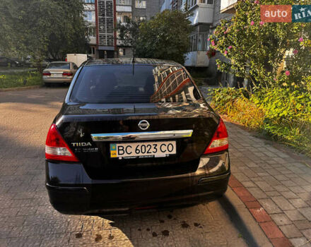Чорний Ніссан Тііда, об'ємом двигуна 1.6 л та пробігом 219 тис. км за 5300 $, фото 2 на Automoto.ua