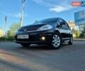 Черный Ниссан Тиида, объемом двигателя 1.6 л и пробегом 26 тыс. км за 9750 $, фото 1 на Automoto.ua