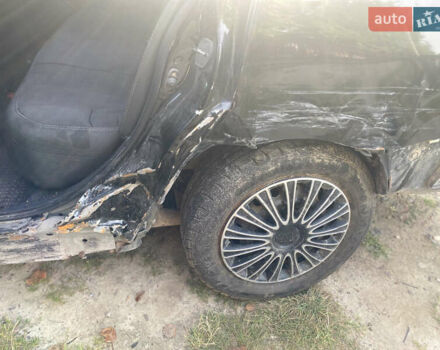 Черный Ниссан Тиида, объемом двигателя 1.6 л и пробегом 182 тыс. км за 3250 $, фото 7 на Automoto.ua