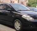 Черный Ниссан Тиида, объемом двигателя 1.6 л и пробегом 150 тыс. км за 7700 $, фото 1 на Automoto.ua