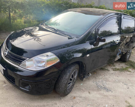 Черный Ниссан Тиида, объемом двигателя 1.6 л и пробегом 182 тыс. км за 3250 $, фото 4 на Automoto.ua