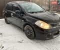 Черный Ниссан Тиида, объемом двигателя 1.6 л и пробегом 182 тыс. км за 3200 $, фото 1 на Automoto.ua