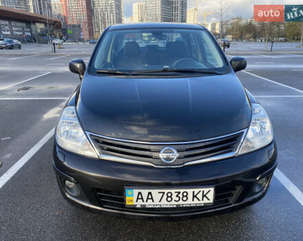 Черный Ниссан Тиида, объемом двигателя 1.6 л и пробегом 138 тыс. км за 7700 $, фото 2 на Automoto.ua